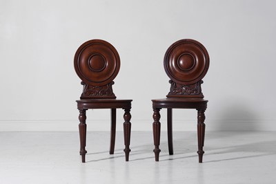 Lot 318 - A pair of Regency mahogany hall chairs