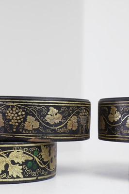 Lot 366 - Two pairs of Regency papier mâché coasters