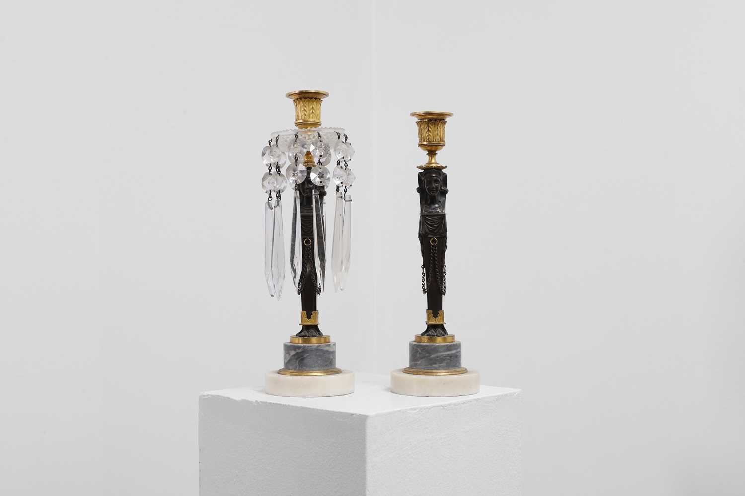 Lot 334 - A pair of Regency Egyptian Revival candelabra