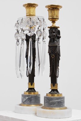 Lot 334 - A pair of Regency Egyptian Revival candelabra