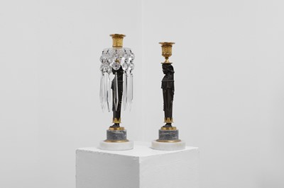 Lot 334 - A pair of Regency Egyptian Revival candelabra