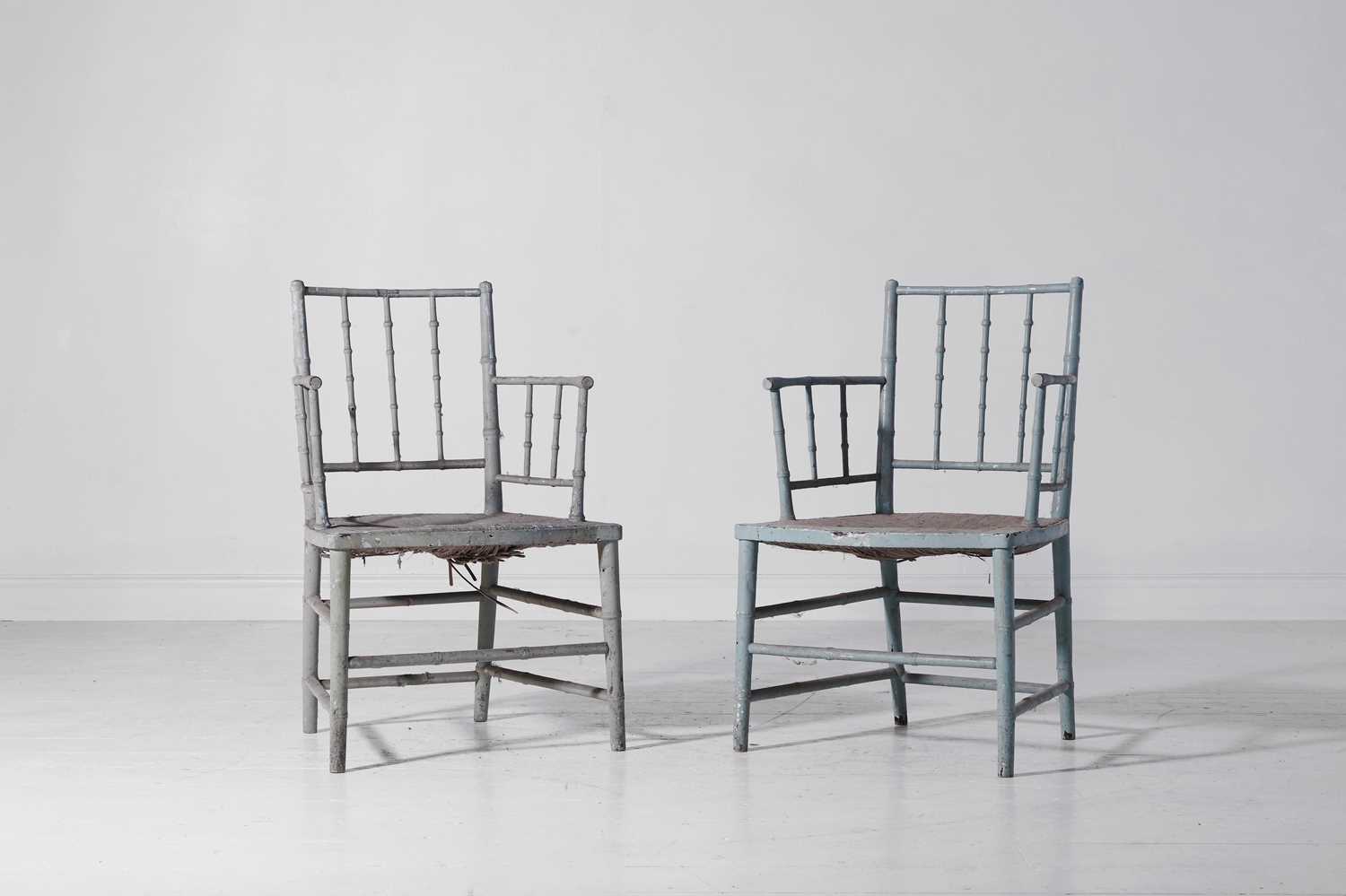 Lot 364 - A pair of Regency, painted wooden, faux bamboo elbow chairs