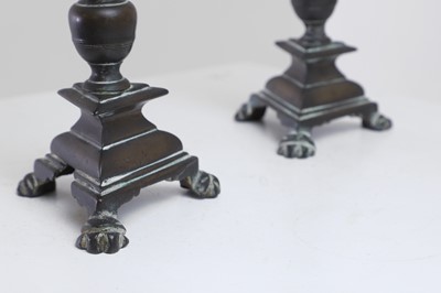 Lot 348 - A pair of bronze pricket candlesticks