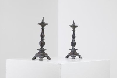Lot 348 - A pair of bronze pricket candlesticks