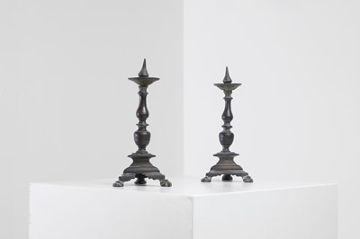 Lot 348 - A pair of bronze pricket candlesticks