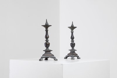 Lot 348 - A pair of bronze pricket candlesticks