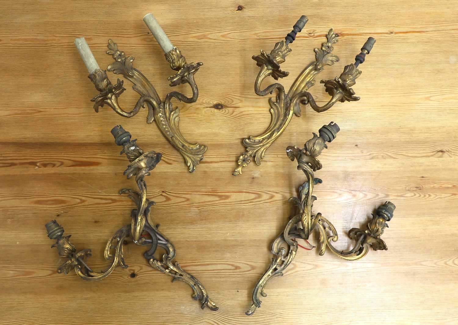 Lot 150 - Two pairs of gilt metal Rococco wall lights