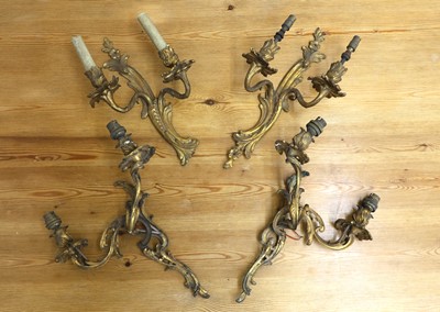Lot 150 - Two pairs of gilt metal Rococco wall lights