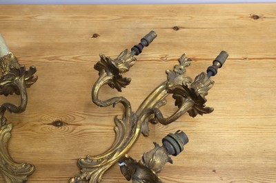 Lot 150 - Two pairs of gilt metal Rococco wall lights