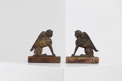 Lot 391 - A pair of grand tour gilt-metal bookends