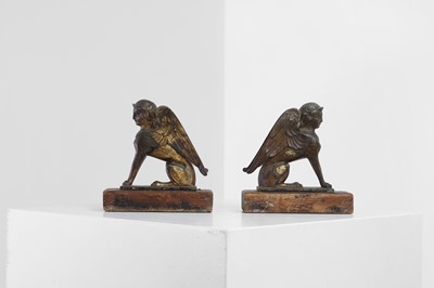 Lot 391 - A pair of grand tour gilt-metal bookends