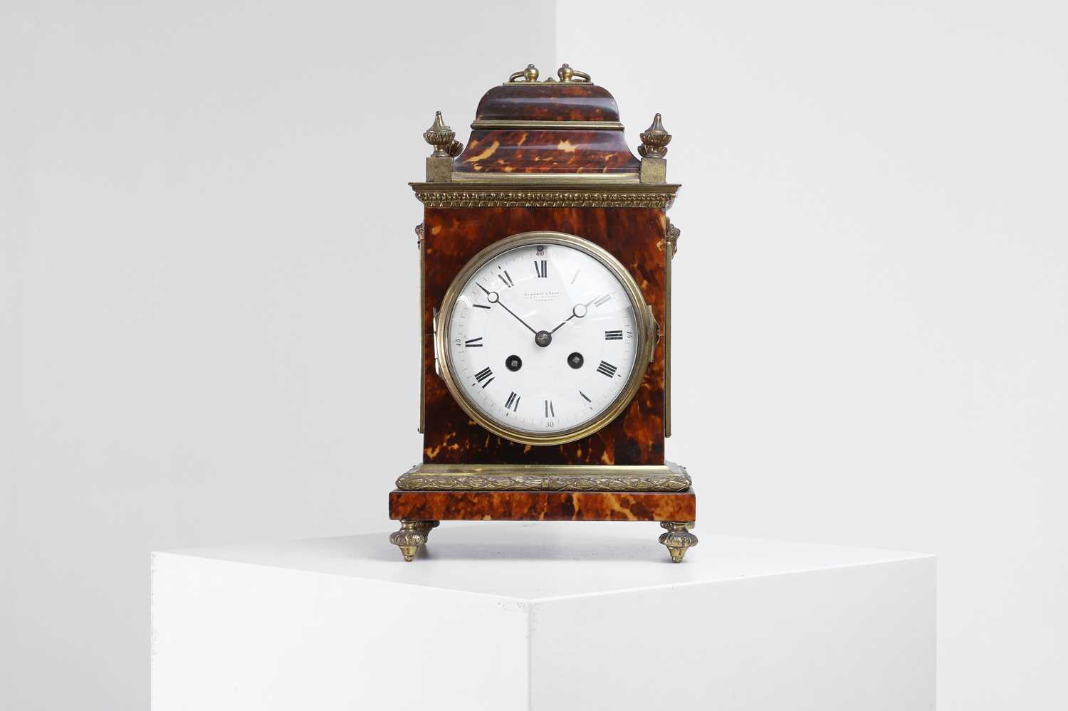 Lot 350 - A gilt-brass and tortoiseshell mantel clock by Andrew Barrett & Sons