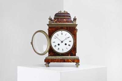 Lot 350 - A gilt-brass and tortoiseshell mantel clock by Andrew Barrett & Sons