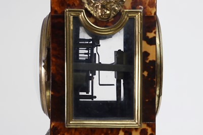 Lot 350 - A gilt-brass and tortoiseshell mantel clock by Andrew Barrett & Sons