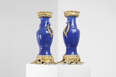 Lot 311 - A pair of ormolu-mounted blue-glazed porcelain vases