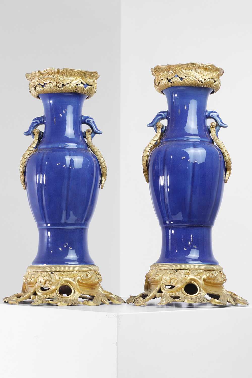 Lot 311 - A pair of ormolu-mounted blue-glazed porcelain vases