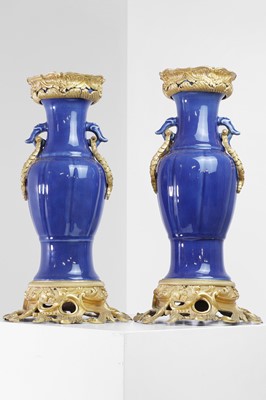 Lot 311 - A pair of ormolu-mounted blue-glazed porcelain vases