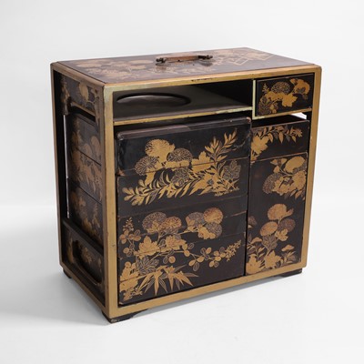 Lot 240 - A Japanese lacquered table cabinet