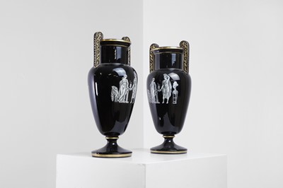 Lot 346 - A pair of black-glazed pottery neoclassical urn vases