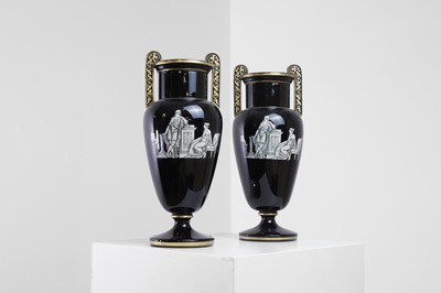 Lot 346 - A pair of black-glazed pottery neoclassical urn vases