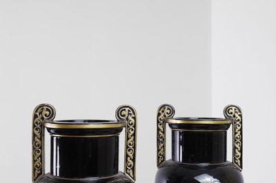 Lot 346 - A pair of black-glazed pottery neoclassical urn vases