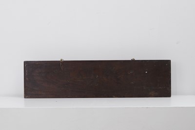 Lot 381 - A carved half-hull model of a ship