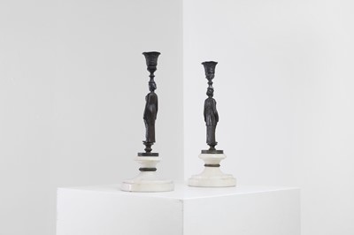 Lot 345 - A pair of neoclassical bronze and marble candlesticks