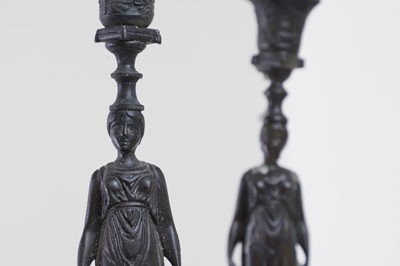 Lot 345 - A pair of neoclassical bronze and marble candlesticks