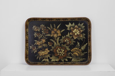 Lot 309 - A parcel-gilt and black-lacquered papier mâché tray