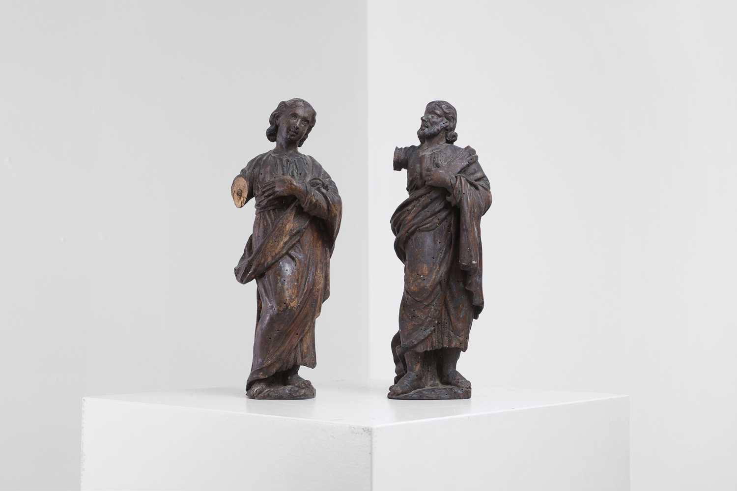 Lot 395 - A pair of baroque carved limewood figures