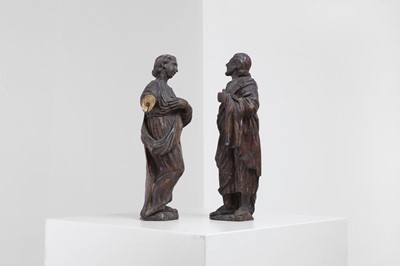 Lot 395 - A pair of baroque carved limewood figures