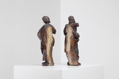 Lot 395 - A pair of baroque carved limewood figures