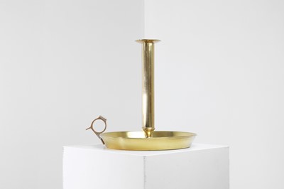 Lot 336 - A large brass chamberstick