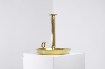 Lot 336 - A large brass chamberstick