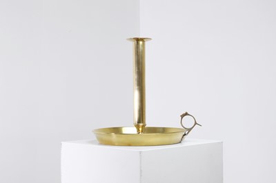 Lot 336 - A large brass chamberstick