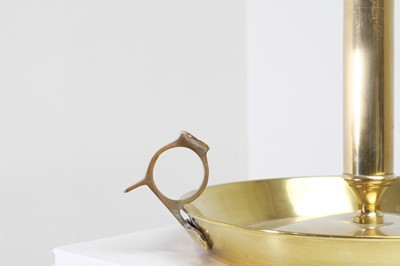 Lot 336 - A large brass chamberstick