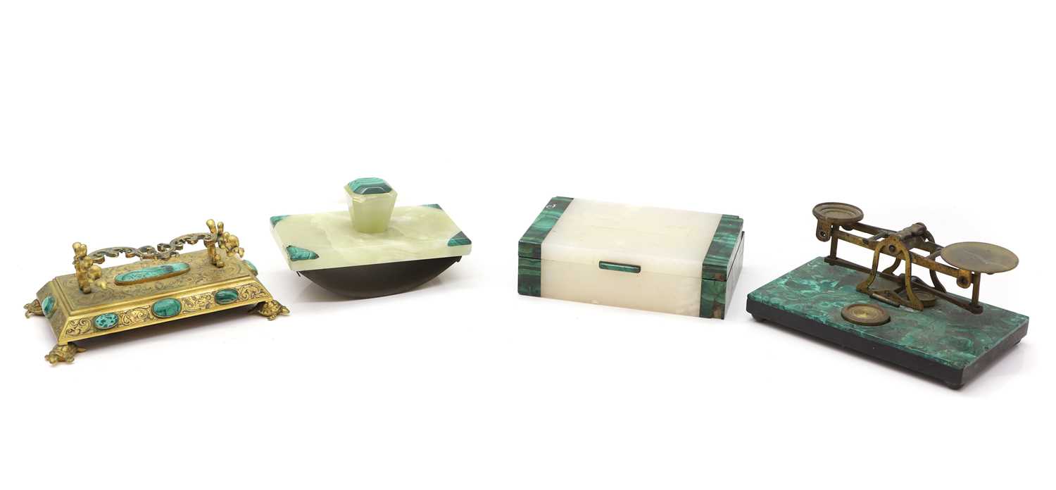 Lot 130 - A gilt metal and malachite mounted pen rest