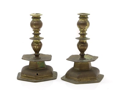 Lot 133 - A pair of hexagonal bronze candlesticks