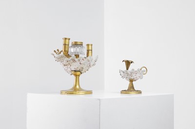 Lot 303 - Two Victorian shell and gilt-metal mounted chambersticks