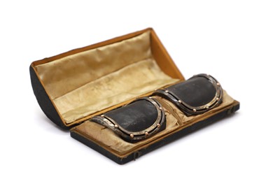 Lot 41 - A pair of George III silver and silver gilt mounted buckles