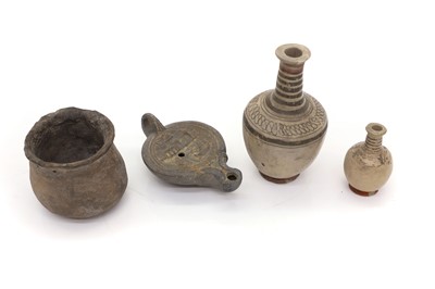 Lot 117 - A roman terracotta oil lamp
