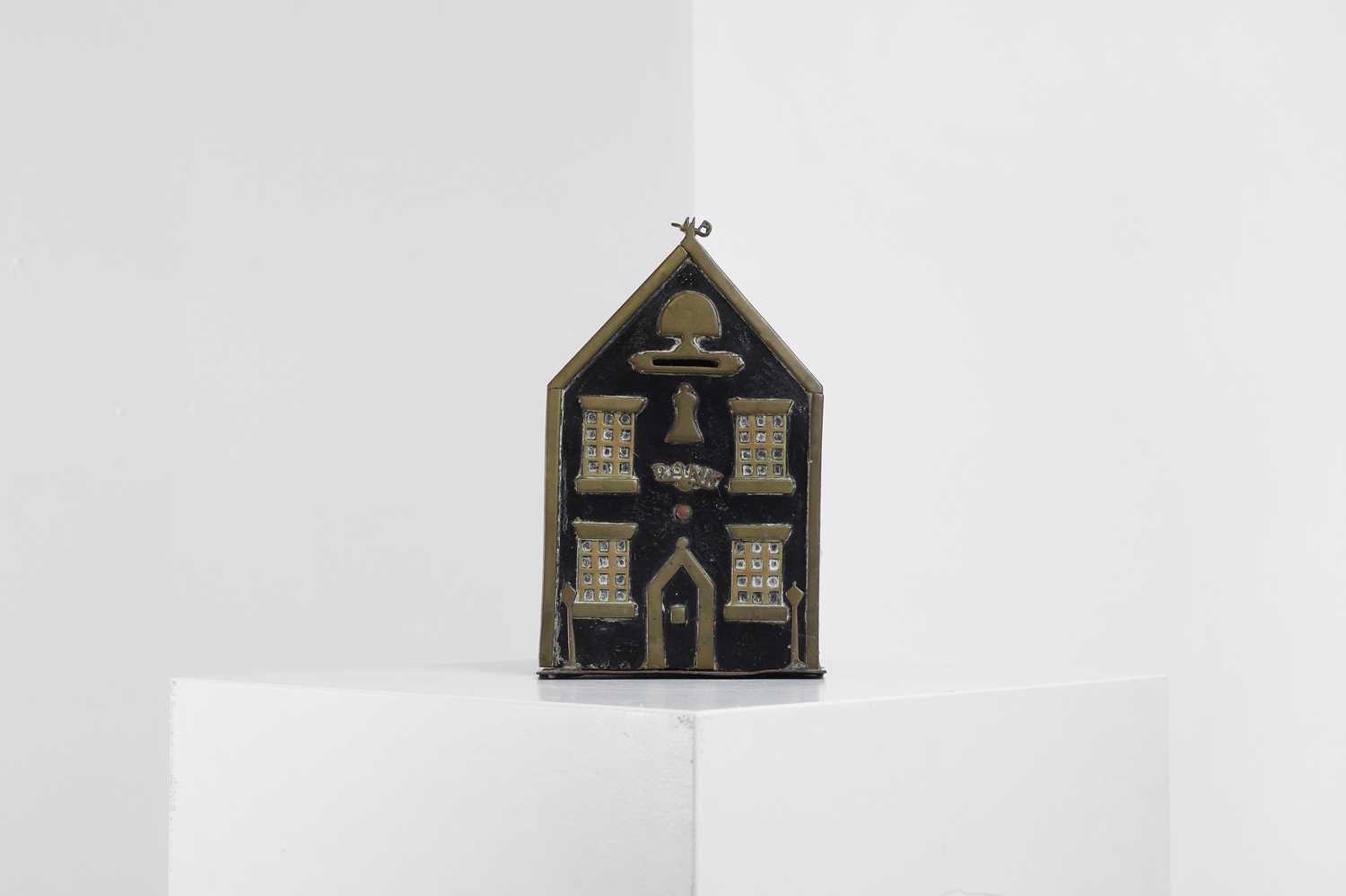 Lot 408 - A folk art steel and brass money box