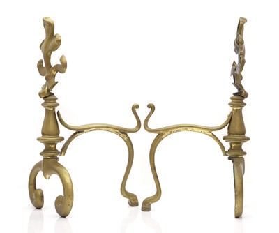 Lot 162 - A pair of brass fleur-de-lis andirons