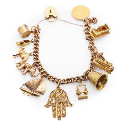 Lot 317 - A curb link charm bracelet