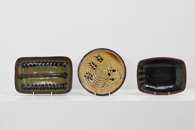 Lot 321 - Three terracotta slipware dishes