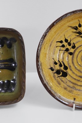 Lot 321 - Three terracotta slipware dishes