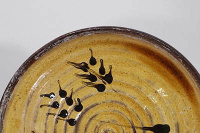 Lot 321 - Three terracotta slipware dishes