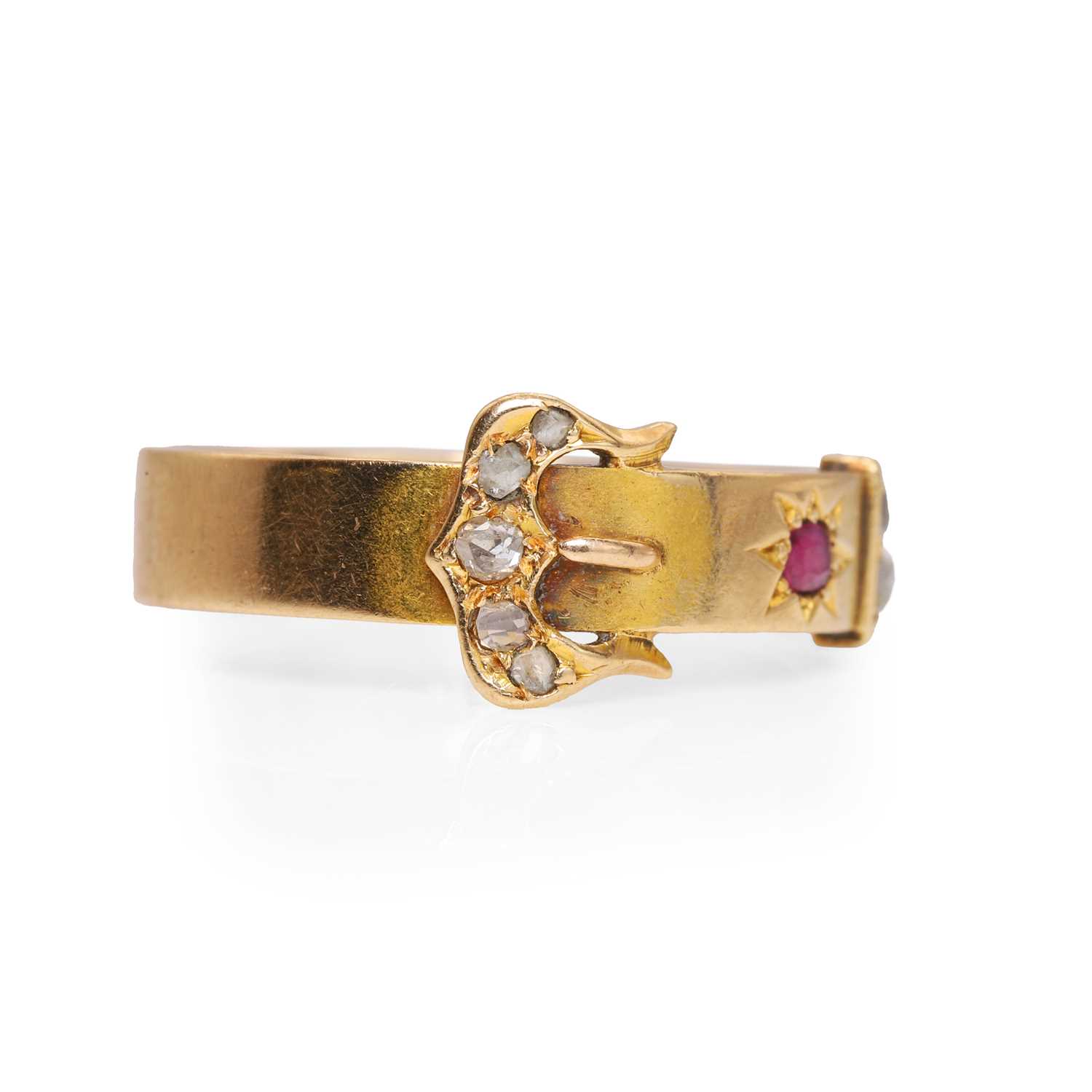Lot 17 - A Victorian 15ct gold ruby and diamond buckle ring