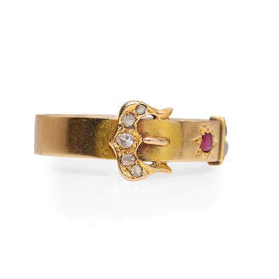 Lot 17 - A 15ct gold ruby and diamond buckle ring