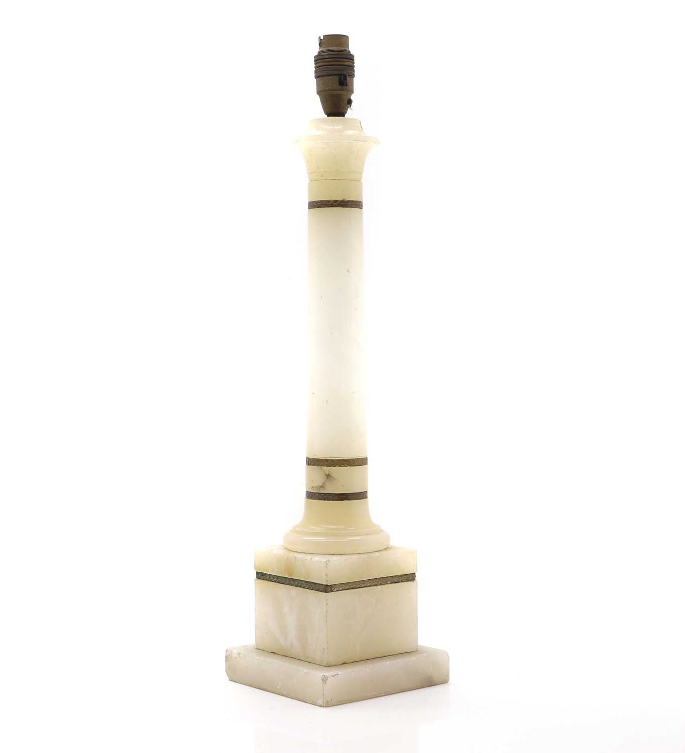 Lot 147 - An alabaster lamp base